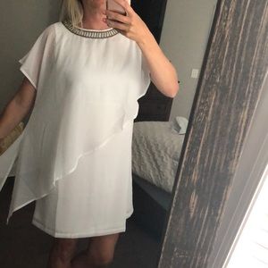White dress with beaded neck detail